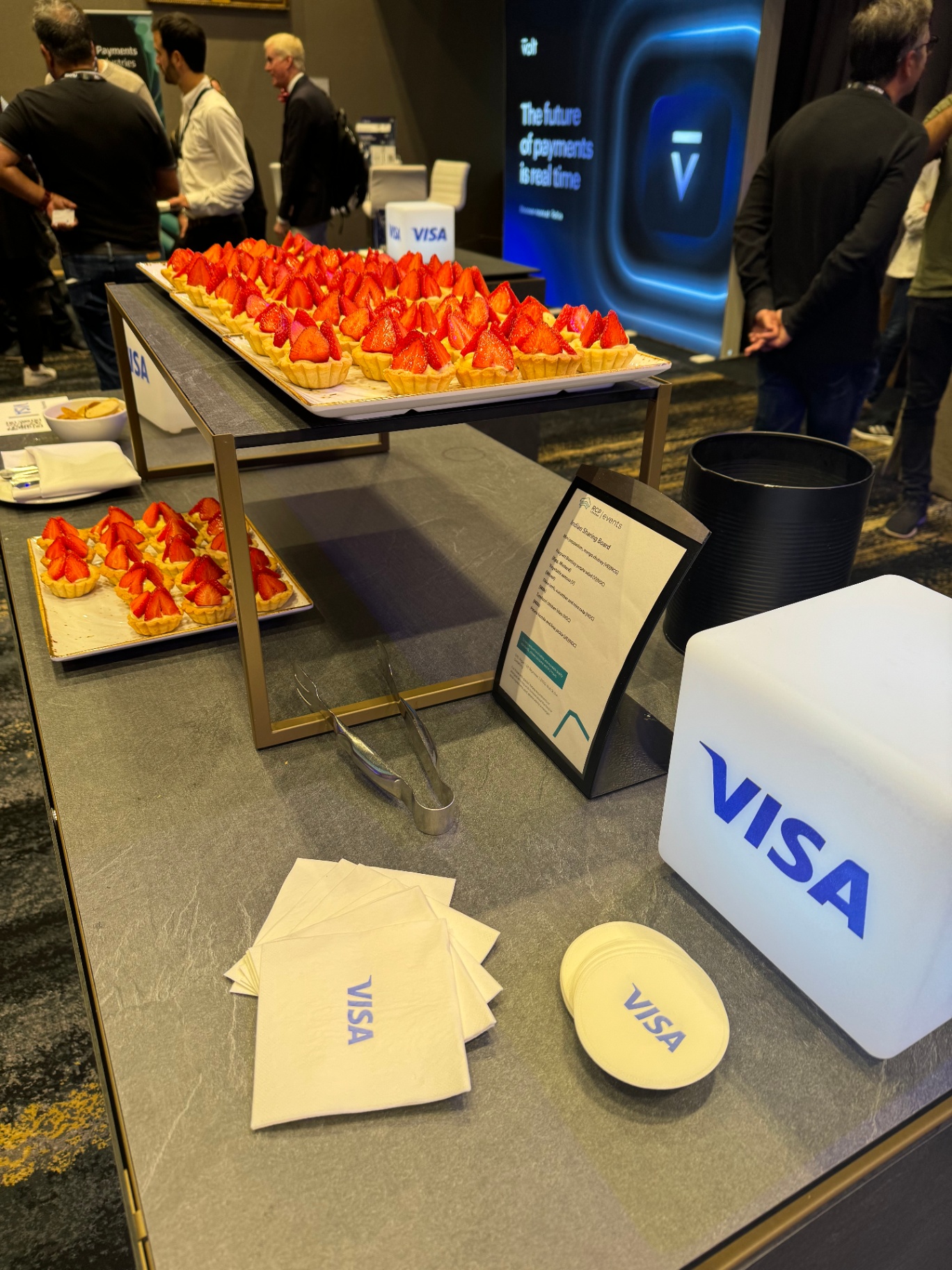 Tiered strawberry tart display with Visa napkins and coasters