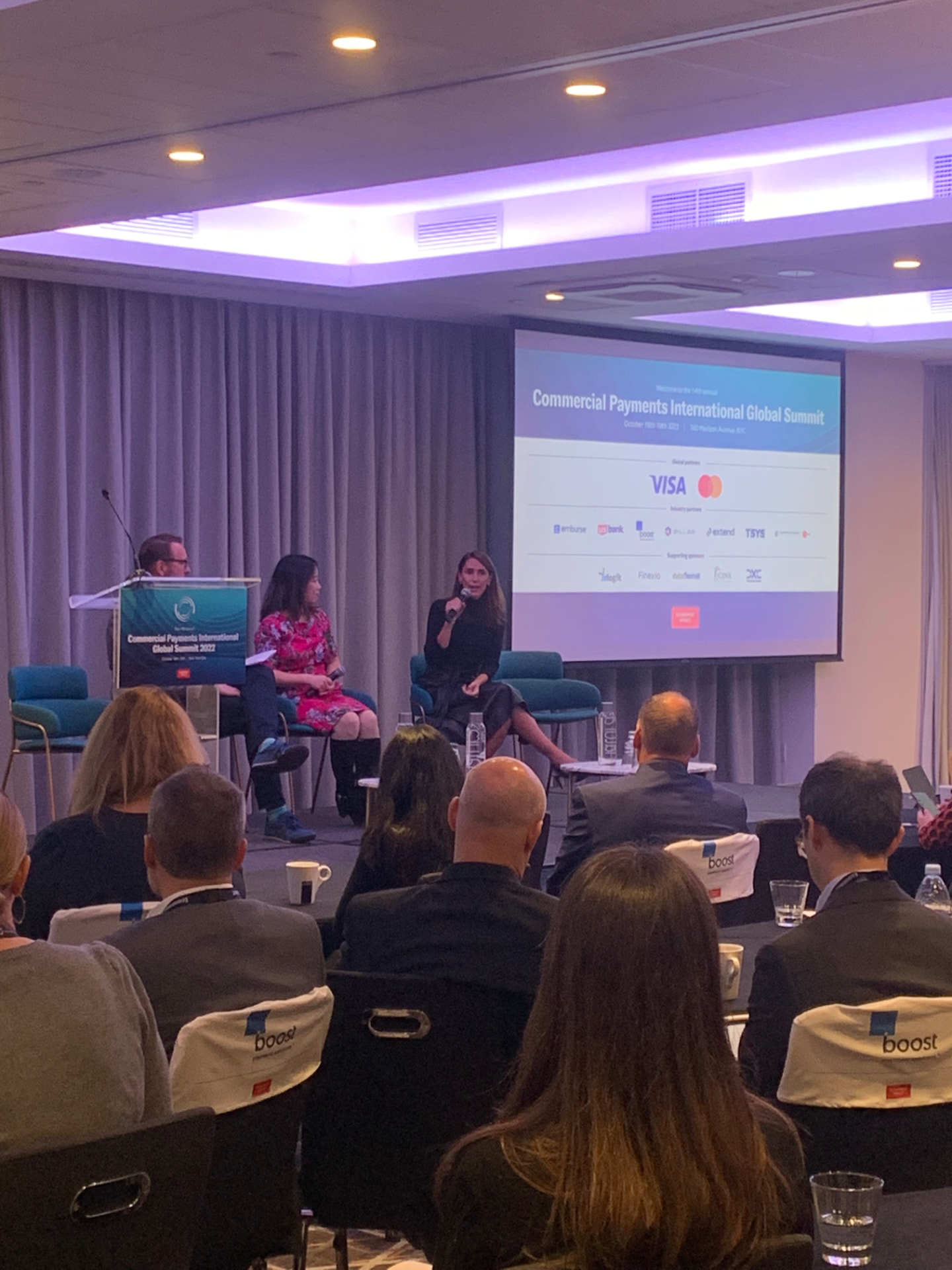 Panel discussion on stage during the state of the market session