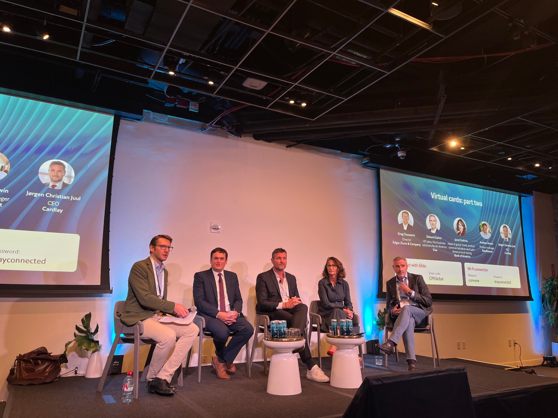 Panel discussion on virtual cards on stage at CPI Global 2023