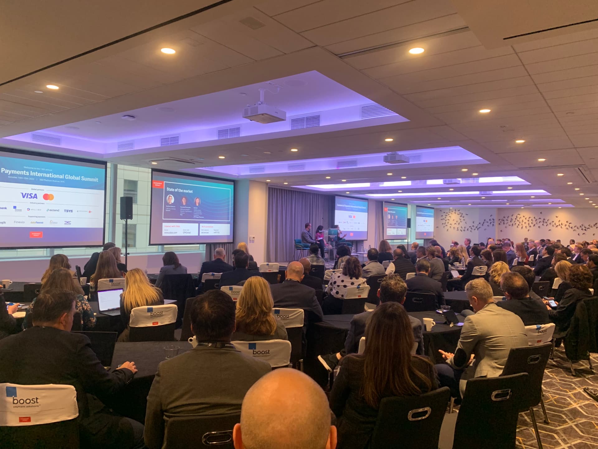 Packed ballroom during the CPI Global Summit 2022 opening session