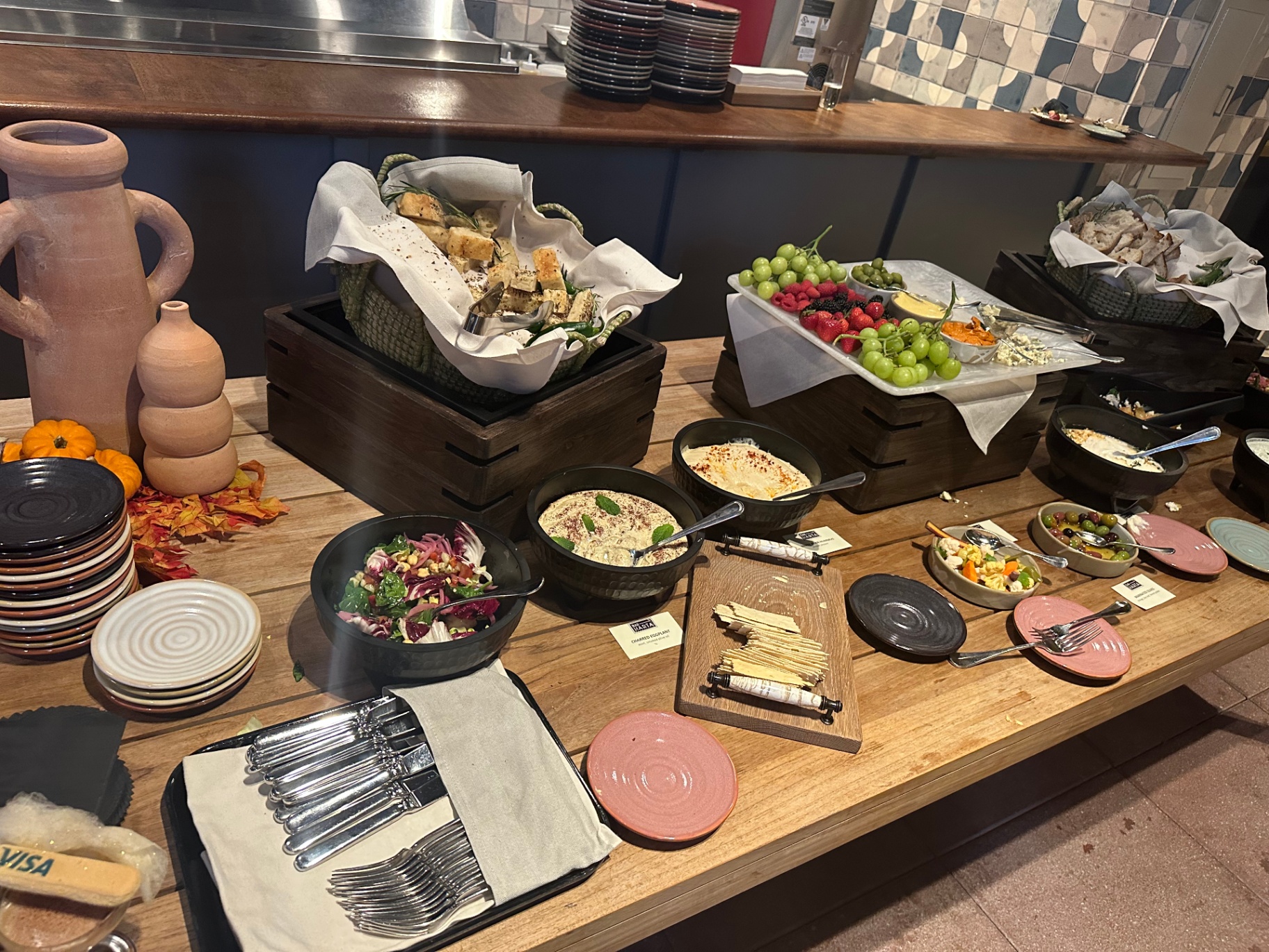 Mediterranean grazing buffet with mezze, breads and fresh fruit