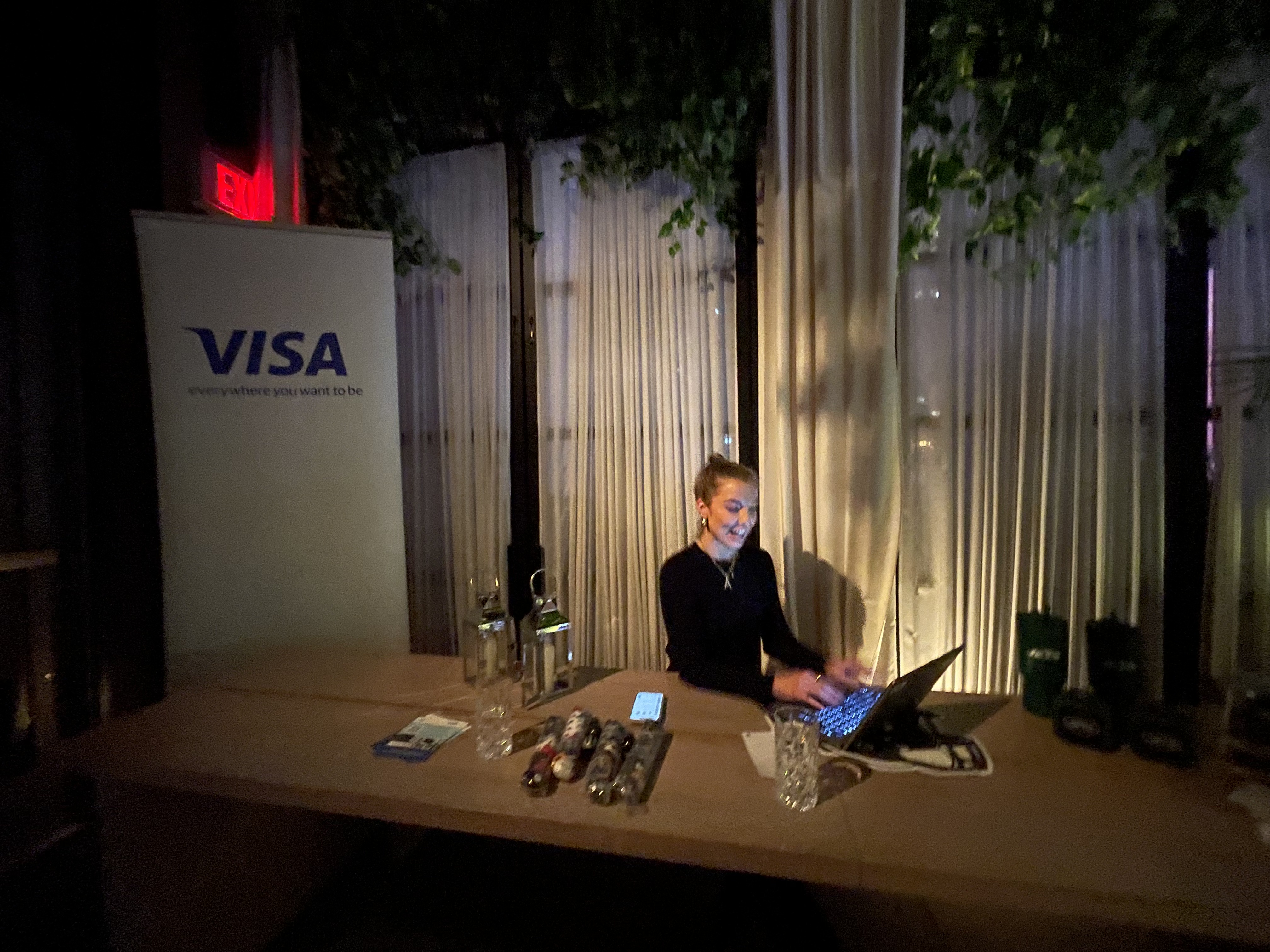 Host checking in guests at the Visa welcome desk at CPI Global 2024