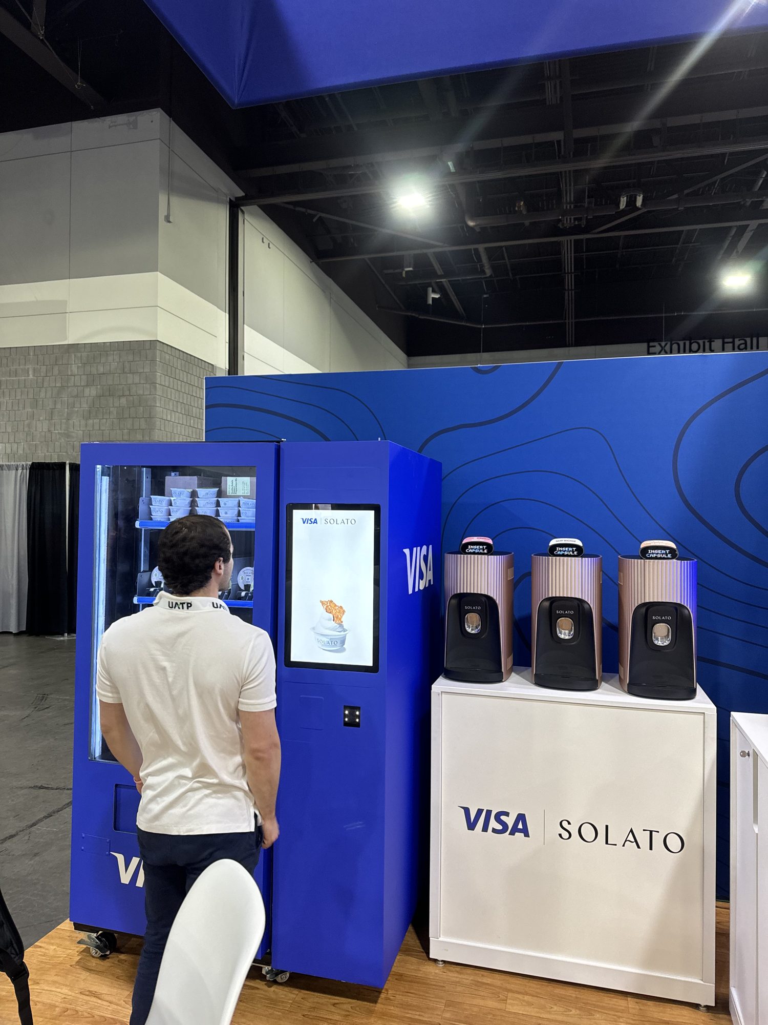 Visa activation on the GBTA convention floor with branded signage